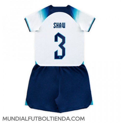Camiseta Inglaterra Luke Shaw #3 Primera Equipación Replica Mundial 2022 para niños mangas cortas (+ Pantalones cortos)
